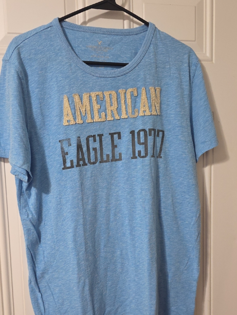 American Eagle Outfitters Heather Light Blue Crewneck Tee with Beige Applique